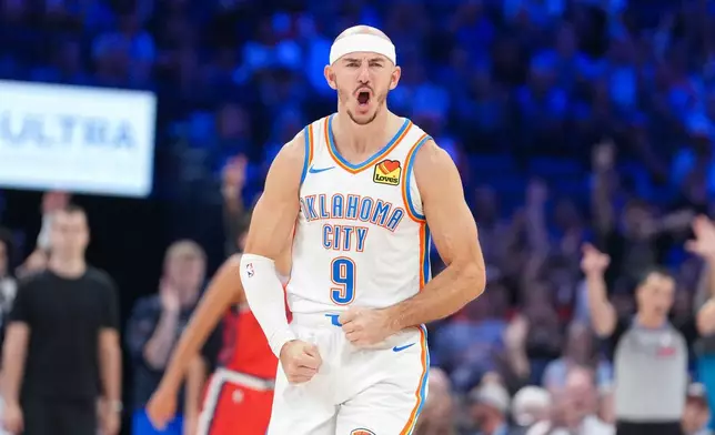 Oklahoma City Thunder guard Alex Caruso celebrates a basket during the second half of an NBA basketball game against the Los Angeles Clippers, Sunday, Oct. 25, 2026, in Oklahoma City. (AP Photo/Kyle Phillips)