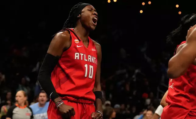 Atlanta Dream's Rhyne Howard reacts during the first half of Game 6 of the WNBA basketball finals against the Golden State Valkyries on Thursday, Oct. 29, 2026, in Atlanta. (AP Photo/Brynn Anderson)