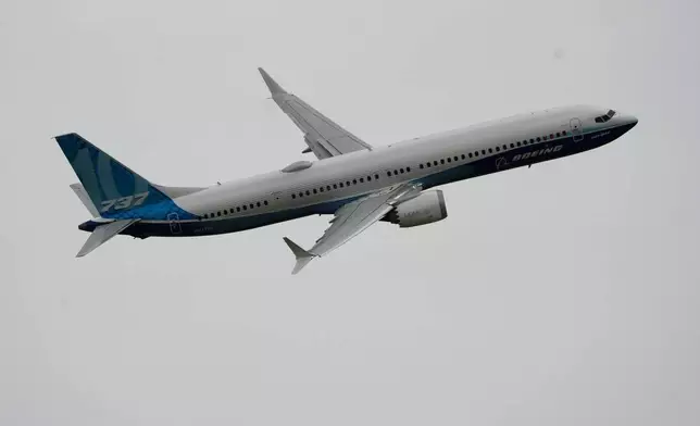 FILE - The Boeing 737 MAX 10 performs a demonstration flight during the Paris Air Show in Le Bourget, north of Paris, France, June 19, 2023. (AP Photo/Lewis Joly, File)