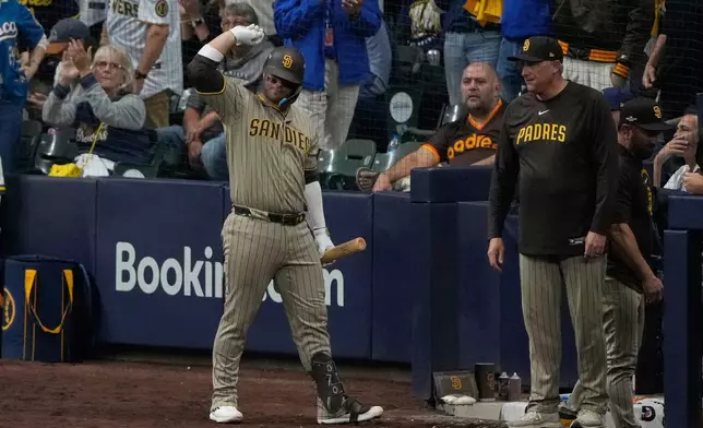 San Diego Padres' Ty France reacts after being called out during the ninth inning in Game 1 of a National League Divisional baseball playoff series against the Milwaukee Brewers Sunday, Oct. 4, 2026, in Milwaukee. (AP Photo/Chris Carlson)