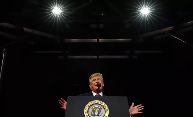 President Donald Trump speaks at a campaign rally at Heartland Credit Union Arena, Monday, Oct. 19, 2026, in Park City, Kan. (AP Photo/Julia Demaree Nikhinson)