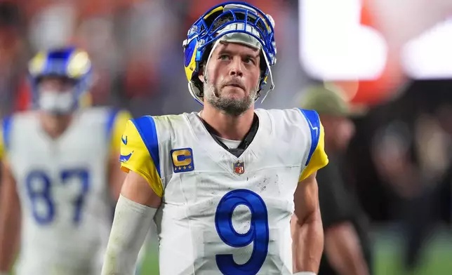 Los Angeles Rams quarterback Matthew Stafford leaves the field following an NFL football game against the Denver Broncos, Sunday, Sept. 27, 2026, in Denver. (AP Photo/David Zalubowski)