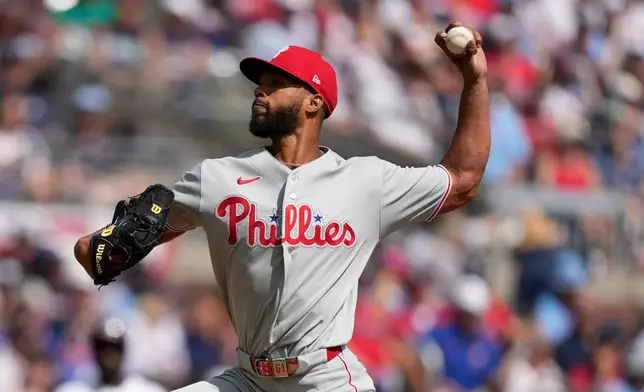 Philadelphia Phillies pitcher Cristopher Sánchez throws against the Atlanta Braves in the first inning during Game 2 of baseball's National League Wild Card Series Wednesday, Sept. 30, 2026, in Atlanta. (AP Photo/Brynn Anderson)
