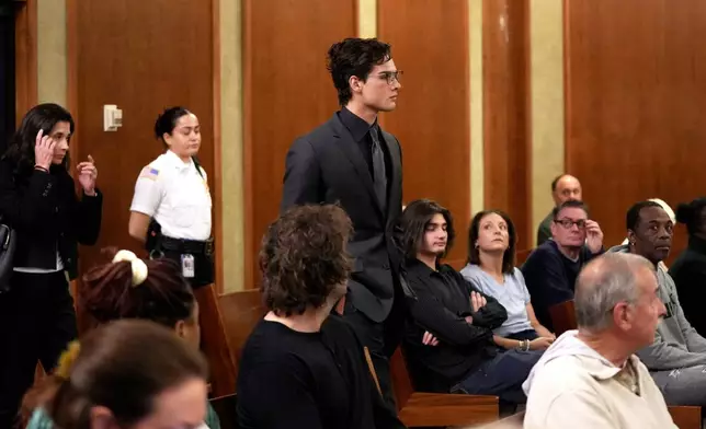 Braden Peters, also known as Clavicular, walks into Orleans District Court for his arraignment, Thursday, Oct. 22, 2026, in Orleans, Mass. (Merrily Cassidy/Cape Cod Times via AP, Pool)
