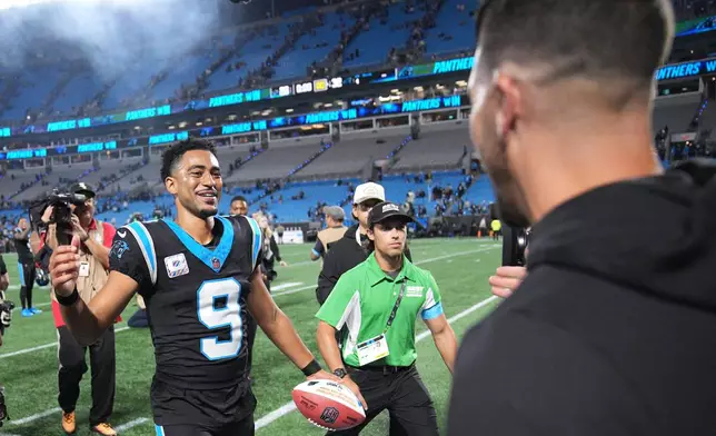 Carolina Panthers quarterback Bryce Young (9) walks off the field after an NFL football game against the Detroit Lions in Charlotte, N.C., Sunday, Oct. 4, 2026. (AP Photo/Jacob Kupferman)