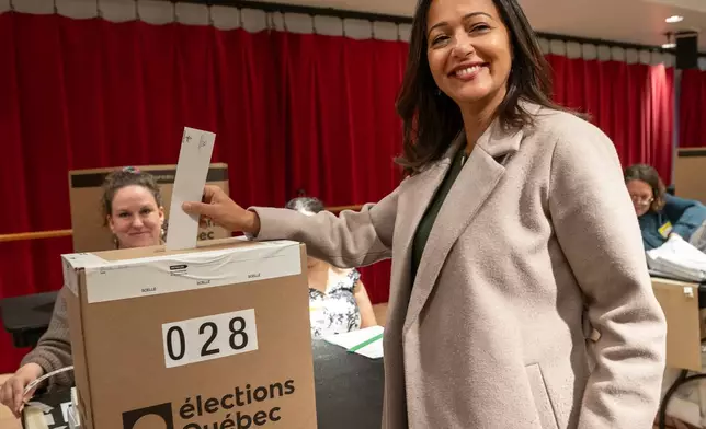 Québec Solidaire co-spokesperson Ruba Ghazal votes in her Montreal riding of Mercier, in the Quebec provincial general election on Monday Oct. 5, 2026. (Peter McCabe/The Canadian Press via AP)