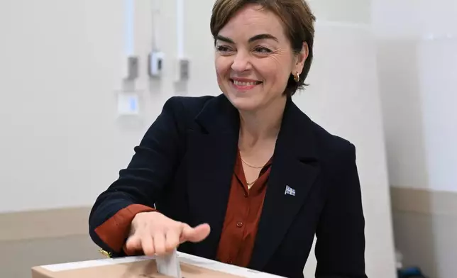 Coalition Avenir Quebec Leader Christine Frechette casts her ballot at the polling office in Trois-Rivieres, Quebec, Monday, Oct. 5, 2026. (Jacques Boissinot/The Canadian Press via AP)