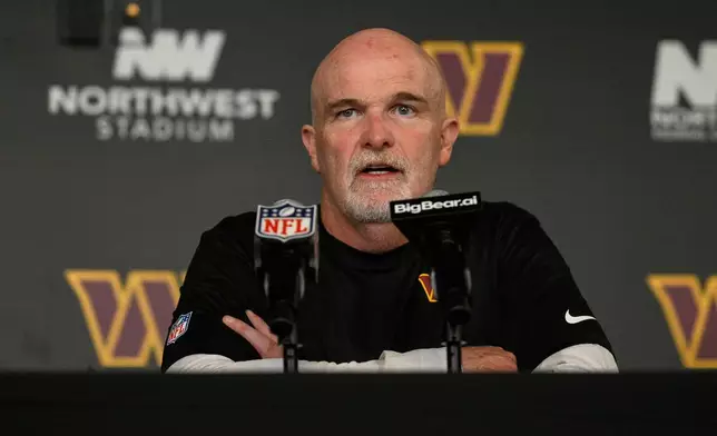 Washington Commanders head coach Dan Quinn speaks during a press conference after an NFL football game against the New York Giants in Landover, Md., Sunday, Oct. 11, 2026. (AP Photo/Nick Wass)