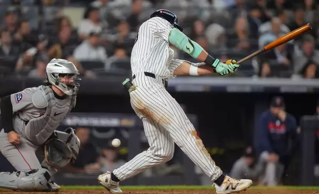 New York Yankees' Spencer Jones strikes out swinging against the Boston Red Sox during the sixth inning in Game 2 of baseball's American League Wild Card Series, Wednesday, Sept. 30, 2026, in New York. (AP Photo/Yuki Iwamura)