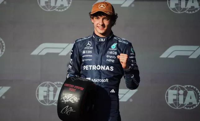 Mercedes driver Kimi Antonelli, of Italy, poses for a photo after winning the pole position for the Formula One United States Grand Prix auto race in Austin, Texas, Saturday, Oct. 24, 2026. (Dustin Safranek/Pool Photo via AP)