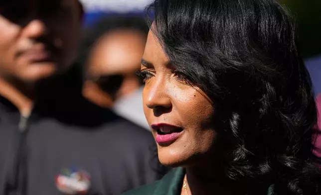 Democratic gubernatorial candidate Keisha Lance Bottoms speaks to the media after voting early in the Georgia Primary Election on Wednesday, Oct. 14, 2026, in Atlanta. (AP Photo/Brynn Anderson)
