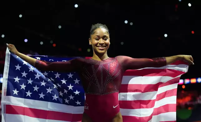 Skye Blakely, of the United States, poses after winning the gold medal in the women's all-around final at the Artistic Gymnastics World Championships in Rotterdam, the Netherlands, Friday, Oct. 23, 2026. (AP Photo/Patrick Post)