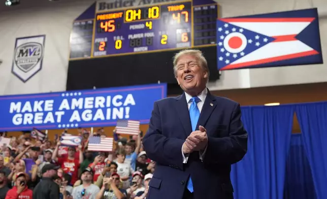 President Donald Trump arrives to speak during an event at Butler High School in Vandalia, Ohio, Saturday, Oct. 3, 2026. (AP Photo/Mark Schiefelbein)