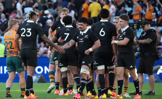New Zealand All Blacks players react after winning against Australia during their Bledisloe Cup rugby union test in Sydney, Saturday, Oct. 17, 2026. (AP Photo/Mark Baker)