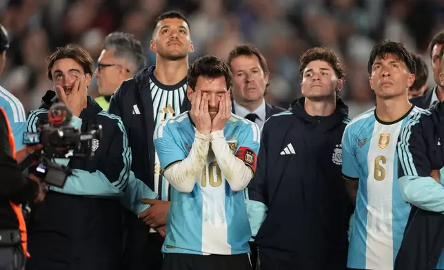 Argentina's Lionel Messi reacts after his final match for the national team, a soccer friendly against Benin, in Buenos Aires, Argentina, Tuesday, Oct.6, 2026. (AP/Photo/Gustavo Garello)