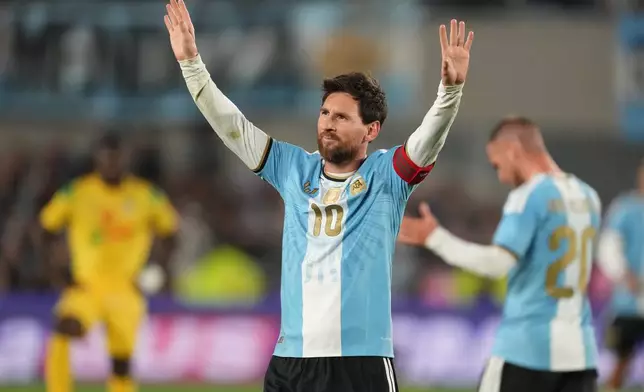 Argentina's Lionel Messi celebrates after scoring his third goal from the penalty spot during his final match for the national team, a soccer friendly against Benin, in Buenos Aires, Argentina, Tuesday, Oct.6, 2026. (AP/Photo/Gustavo Garello)