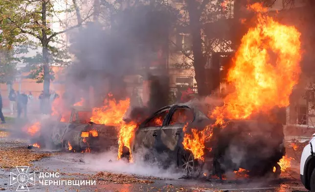 In this photo provided by the Ukrainian Emergency Service, cars are on fire following a Russian air attack in Chernyhiv, Ukraine, Thursday, Oct. 29, 2026. (Ukrainian Emergency Service via AP)