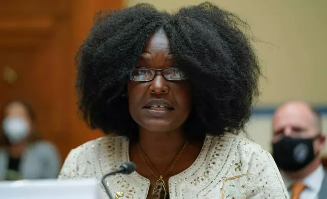 FILE - Zeneta Everhart, whose son Zaire Goodman was shot in the neck during the Buffalo Tops supermarket mass shooting and survived, testifies during a House Committee on Oversight and Reform hearing on gun violence on Capitol Hill in Washington on June 8, 2022. (AP Photo/Andrew Harnik, Pool, File)