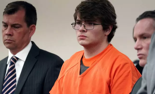 FILE - Payton Gendron, center, listens as he is sentenced, Feb 15, 2023, in Buffalo, N.Y. (Derek Gee/The Buffalo News via AP, Pool, File)