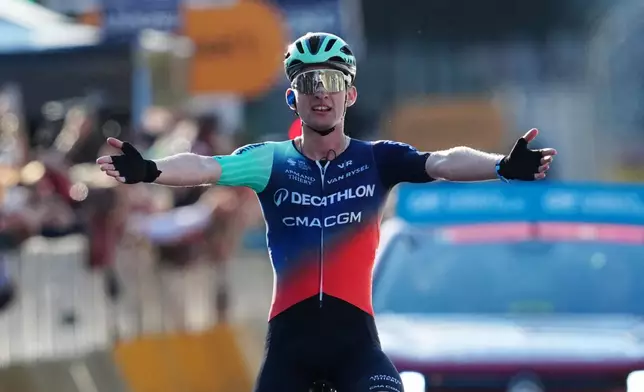 France's Paul Seixas celebrates winning Il Lombardia, Tour of Lombardy cycling race, in Como, Italy, Saturday, Oct. 10, 2026. (Gian Mattia D'Alberto/LaPresse via AP)
