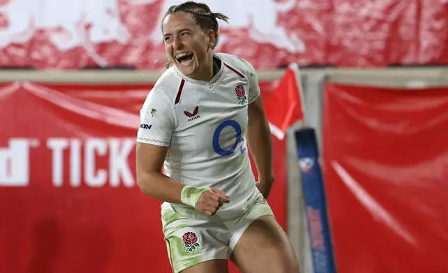 England's Claudia Moloney-MacDonald reacts after scoring a try during the second half of an international women's rugby match against the United States during the WXV Global Series, Friday, Oct. 30, 2026, in Harrison, N.J. (AP Photo/Pamela Smith)