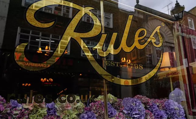View at the window of London's oldest Restaurant ' Rules' which has been donated to Europe's biggest conservation charity in London, Wednesday, Oct. 14, 2026.(AP Photo/Alberto Pezzali)