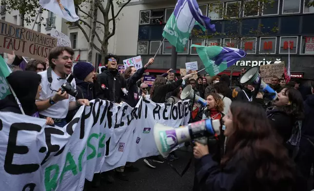 Students chant slogans during a demonstration against rising living costs in Paris, Saturday, Oct. 24, 2026. (AP Photo/Thibault Camus)