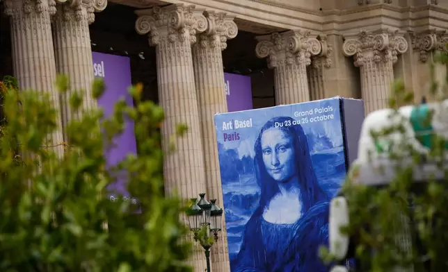 Paris' Grand Palais hosting Art Basel art fair is pictured Friday, Oct. 23, 2026 after planned anti-government protests prompted organizers to cancel their weekend program. (AP Photo/Teresa Suarez)