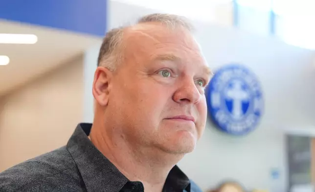 Keith Castello pauses during a conversation at Coram Deo Academy in Flower Mound, Texas, Tuesday, Aug. 11, 2026. (AP Photo/LM Otero)