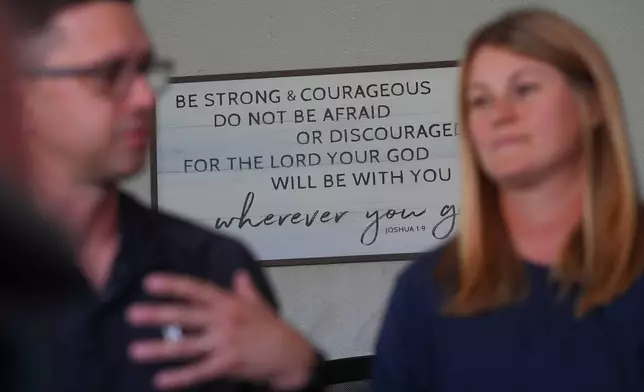 Parents Nathanael Wydner, left, and Candice Wydner sit during an interview at Coram Deo Academy in Flower Mound, Texas, Tuesday, Aug. 11, 2026. (AP Photo/LM Otero)