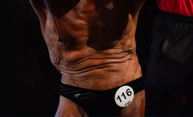 Japanese bodybuilder Toshisuke Kanazawa, 90, prepares to compete in the 2026 IFBB World Fitness and Bodybuilding Championships in Santa Susanna, Spain, Friday, Oct. 30, 2026. (AP Photo/Pau Venteo)
