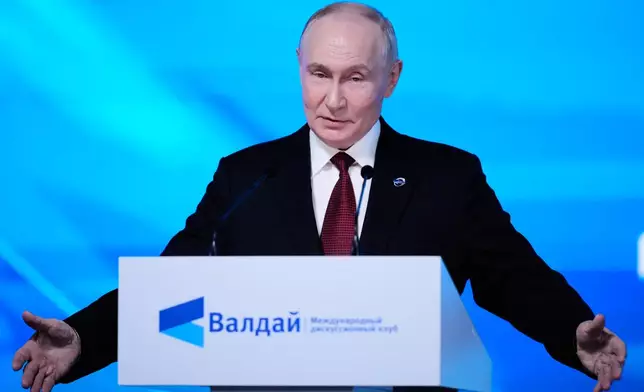 Russian President Vladimir Putin gestures speaking at the session of the Valdai Discussion Club in Moscow, Thursday, Oct. 1, 2026. (AP Photo/Pavel Bednyakov)