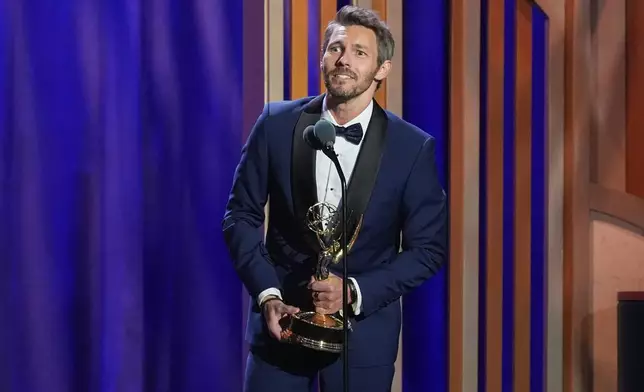 Scott Clifton accepts the award for outstanding lead actor in a daytime drama series for "The Bold and the Beautiful" during the 53rd Annual Daytime Emmy Awards on Friday, Oct. 30, 2026, at the Hollywood Palladium in Los Angeles. (AP Photo/Chris Pizzello)