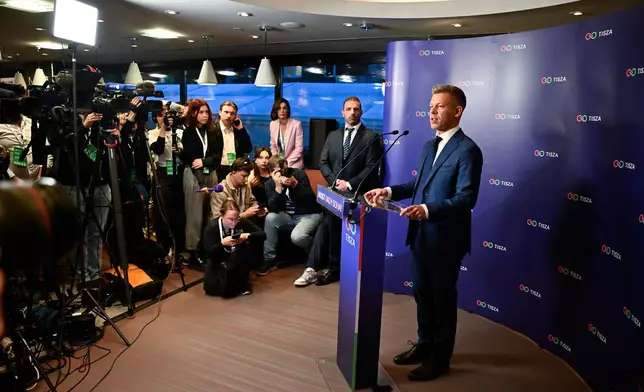 FILE - Peter Magyar, leader of the opposition Tisza party, speaks to the media after polls closed, during the Hungarian parliamentary election in Budapest, Hungary, Sunday, April 12, 2026. (AP Photo/Denes Erdos, File)