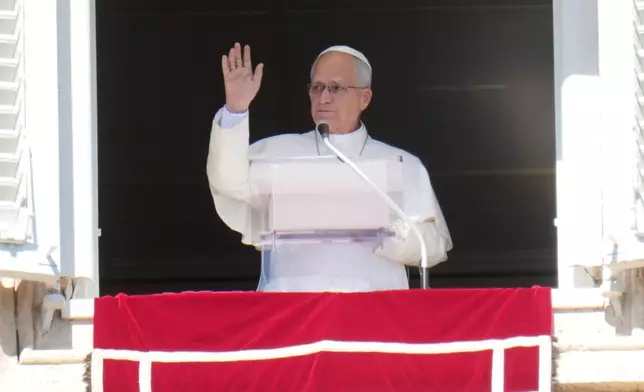 Pope Leo XIV delivers the Angelus prayer in St. Peter's Square at the Vatican, Sunday, Oct. 11, 2026. (AP Photo/Gregorio Borgia)
