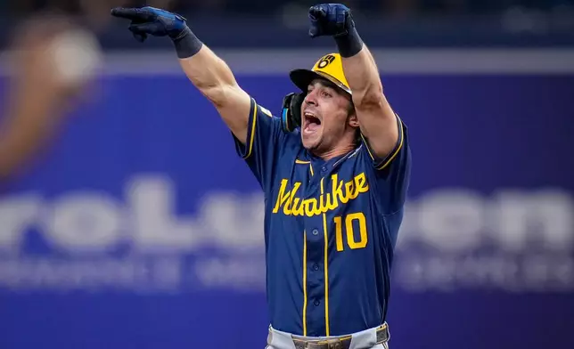 Milwaukee Brewers right fielder Sal Frelick celebrates his RBI double during the fifth inning of Game 3 of baseball's World Series, Monday, Oct. 26, 2026, in St. Petersburg, Fla., between the Milwaukee Brewers and the Tampa Bay Rays. (AP Photo/Chris O'Meara)