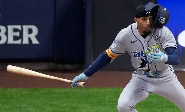 Tampa Bay Rays left fielder Chandler Simpson singles during the first inning of Game 1 of baseball's World Series, Friday, Oct. 23, 2026, in Milwaukee, between the Milwaukee Brewers and the Tampa Bay Rays. (AP Photo/David J. Phillip)