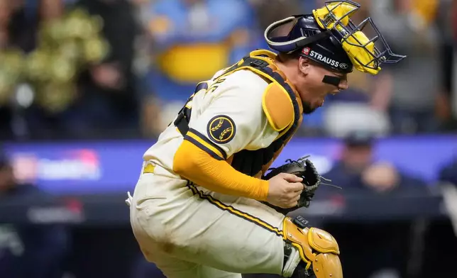 Milwaukee Brewers catcher William Contreras celebrates the final out of Game 2 of baseball's World Series, Saturday, Oct. 24, 2026, in Milwaukee, between the Milwaukee Brewers and the Tampa Bay Rays. (AP Photo/Ashley Landis)