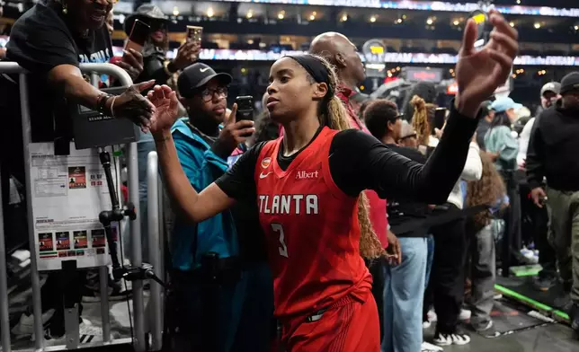 Atlanta Dream's Jordin Canada walks of the court after the Dream won Game 6 of the WNBA basketball finals against the Golden State Valkyries on Thursday, Oct. 29, 2026, in Atlanta. (AP Photo/Brynn Anderson)