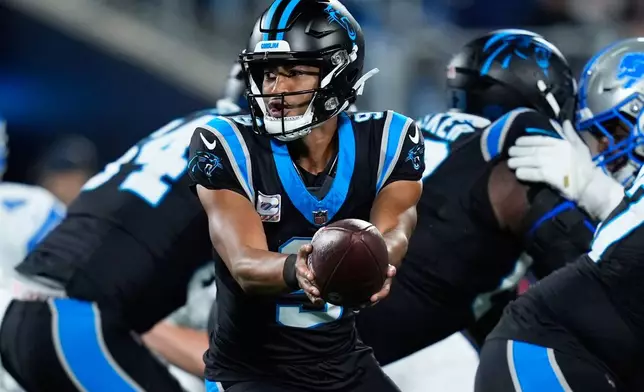 Carolina Panthers quarterback Bryce Young (9) passes the ball during an NFL football game against the Detroit Lions in Charlotte, N.C., Sunday, Oct. 4, 2026. (AP Photo/Erik Verduzco)