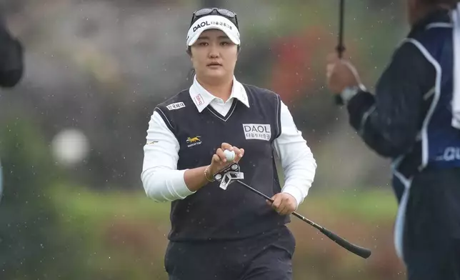 South Korea's Haeran Ryu walks on the 18th green during the third round of the LPGA BMW Ladies Championship at the Pine Beach Golf Links, in Haenam, South Korea, Saturday, Oct. 24, 2026. (AP Photo/Lee Jin-man)