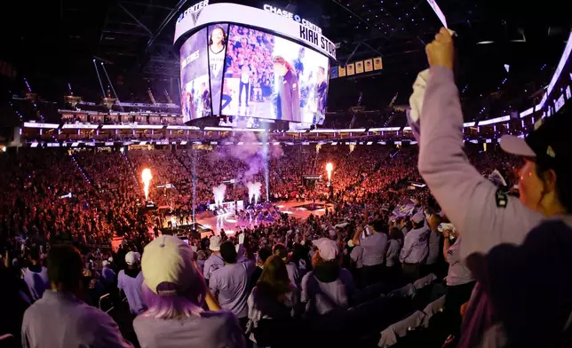 Fans cheer as the Golden State Valkyries and the Atlanta Dream face off in Game 2 of the WNBA basketball finals in San Francisco, Monday, Oct. 19, 2026. (Jessica Chastain/San Francisco Chronicle via AP)