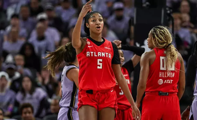 Atlanta Dream forward Angel Reese (5) calls for a replay during the second half of Game 2 of the WNBA basketball finals against the Golden State Valkyries, Monday, Oct. 19, 2026, in San Francisco. (AP Photo/Justine Willard)