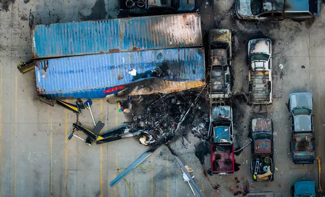 An aerial view of the aftermath of a news helicopter that crashed in Chatsworth, a neighborhood in Los Angeles, Wednesday, Sept. 16, 2026. (AP Photo/Ethan Swope)