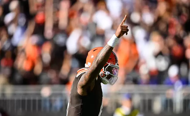 Cleveland Browns quarterback Deshaun Watson gestures after running back Audric Estime scored a touchdown during the second half of an NFL football game against the Baltimore Ravens in Cleveland, Sunday, Oct. 18, 2026. (AP Photo/David Richard)