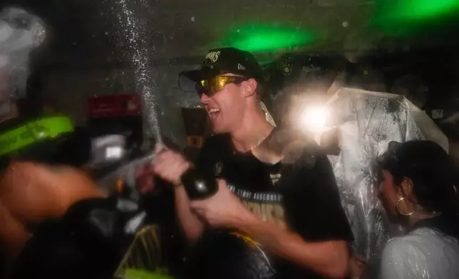 Milwaukee Brewers pitcher Jacob Misiorowski celebrates with teammates after winning baseball's World Series, against the Tampa Bay Rays, Wednesday, Oct. 28, 2026, in St. Petersburg, Fla. (AP Photo/Chris O'Meara)