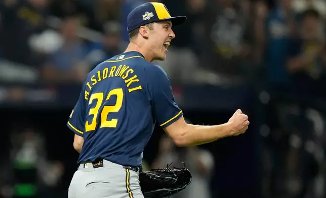 Milwaukee Brewers pitcher Jacob Misiorowski celebrates the end of the fourth inning of Game 5 of baseball's World Series, Wednesday, Oct. 28, 2026, in St. Petersburg, Fla., between the Milwaukee Brewers and the Tampa Bay Rays. (AP Photo/Ashley Landis)