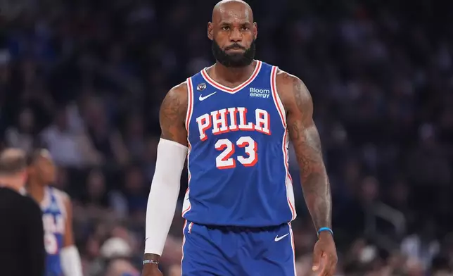 Philadelphia 76ers forward LeBron James looks on during the first half of an NBA basketball game against the New York Knicks Tuesday, Oct. 20, 2026, in New York. (AP Photo/Frank Franklin II)