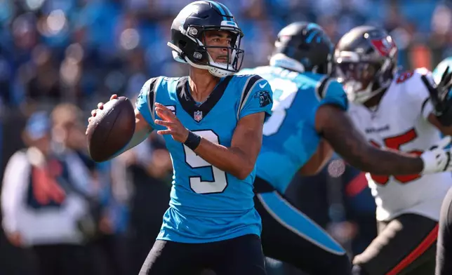 Carolina Panthers quarterback Bryce Young (9) throws a pass during the first half of an NFL football game against the Tampa Bay Buccaneers in Charlotte, N.C., Sunday, Oct. 25, 2026. (AP Photo/Scott Kinser)