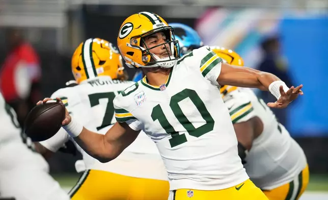 Green Bay Packers quarterback Jordan Love throws a pass during the second half of an NFL football game against the Detroit Lions, Sunday, Oct. 25, 2026, in Detroit. (AP Photo/Paul Sancya)